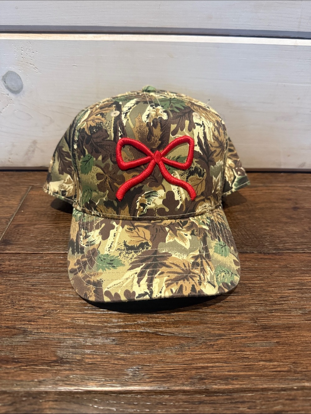 Camo Trucker hat with Red Bow Embroidery